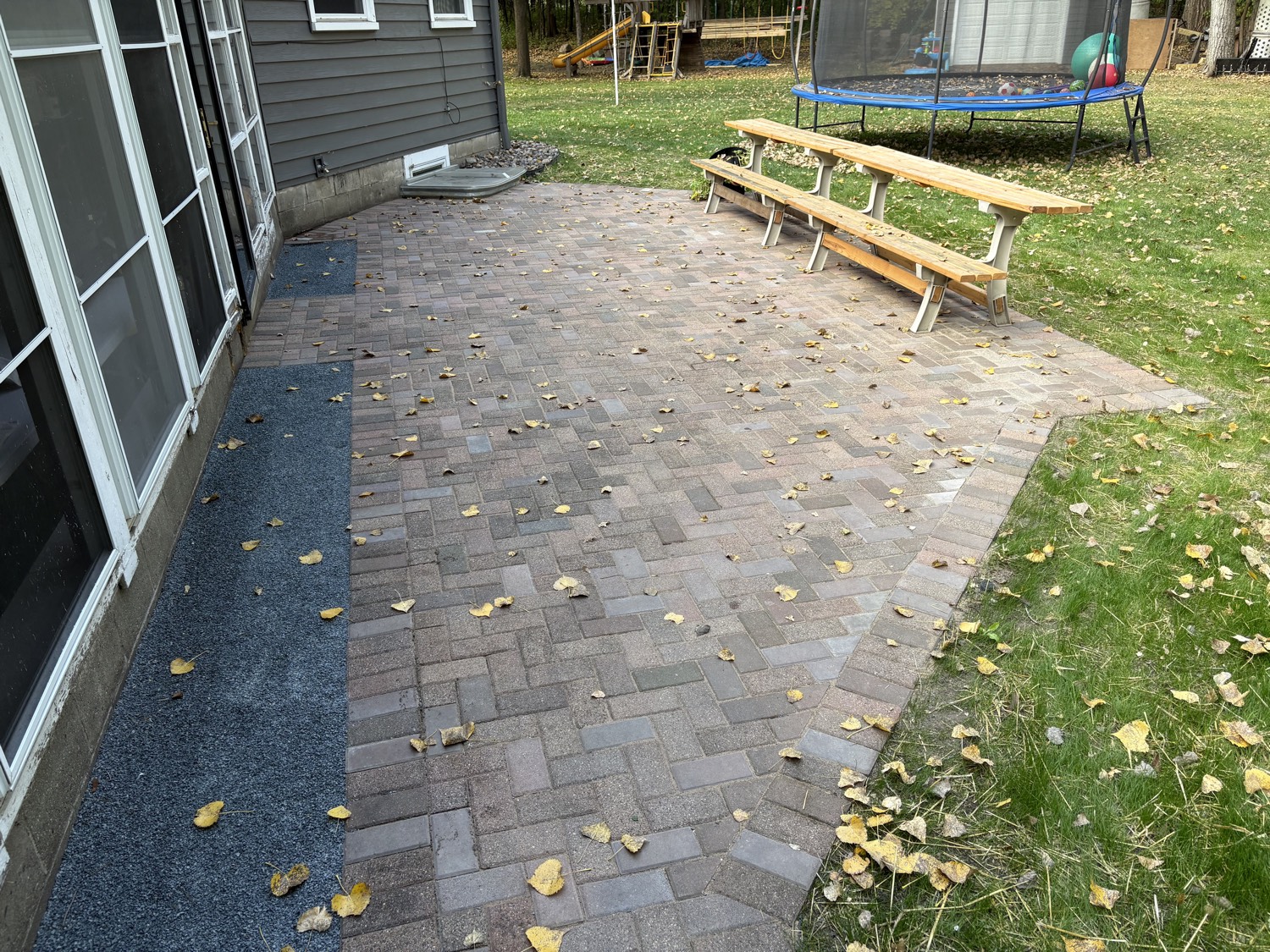 Pavers laid for the patio next to the house